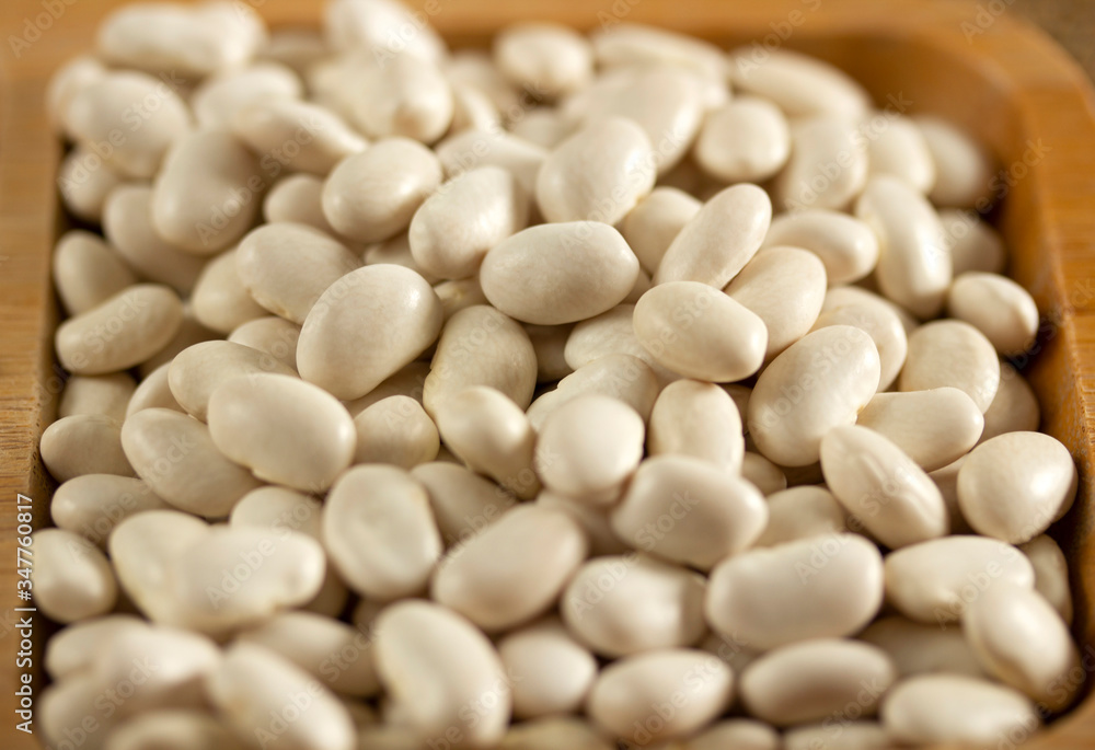 white beans in a wooden plate white beans in a wooden plate