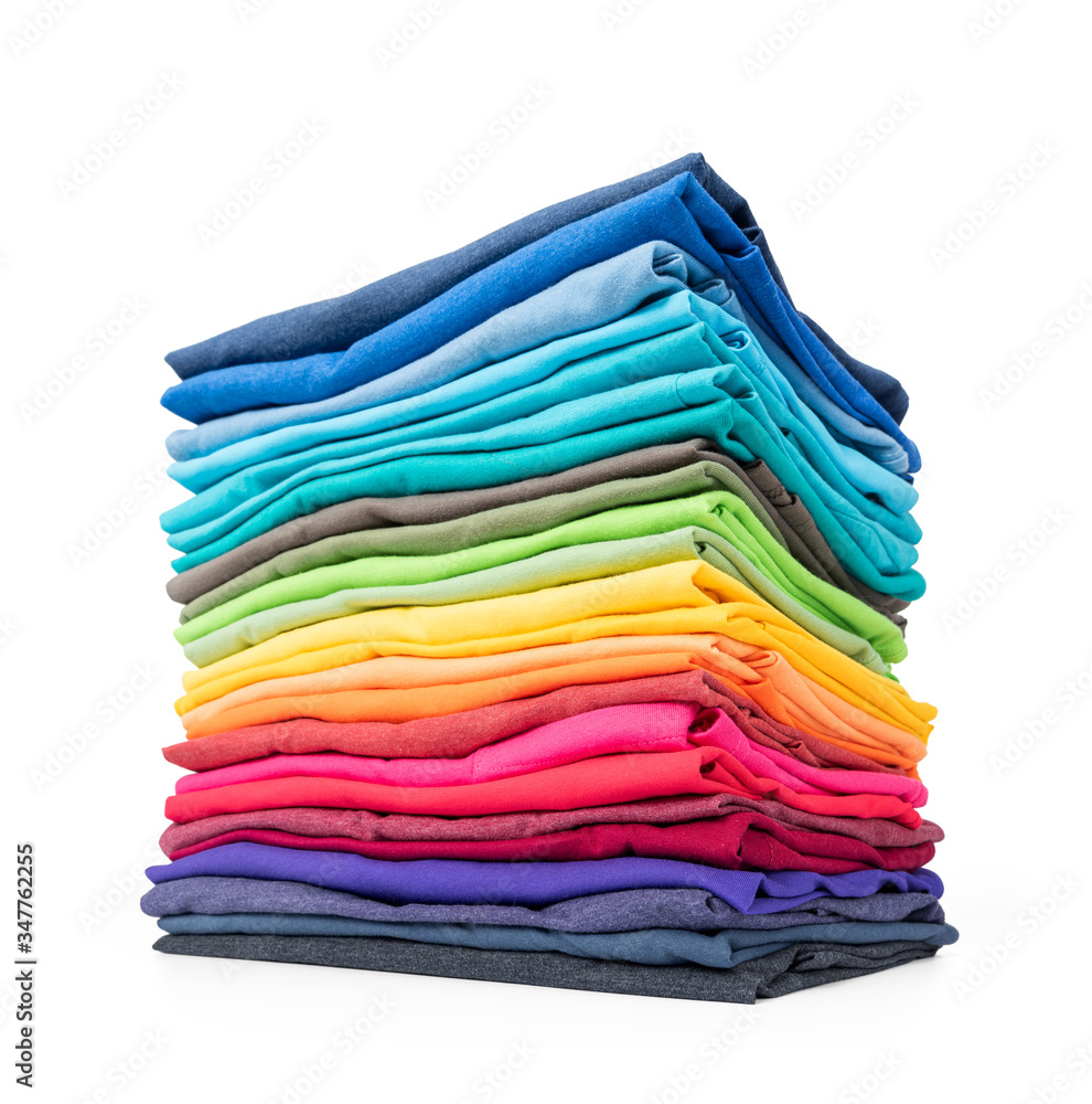 Stack tower of colorful t-shirt isolated on white background. File contains a path to isolation. Stack tower of colorful t-shirt isolated on white background. File contains a path to isolation.