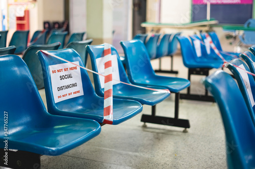 Social distance concept. Empty public chairs with cross sign make separate for physical distancing  increasing physical space between people during the period of the COVID-19 coronavirus pandemic