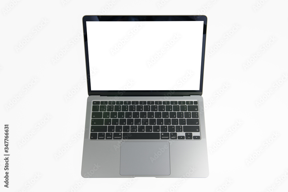 Close-up top view of ultrabook, a thin and light laptop, in space grey color on white isolated background Close-up top view of ultrabook, a thin and light laptop, in space grey color on white isolated background