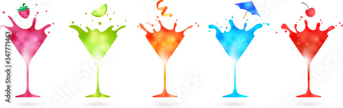 fruit falling into a group of splashing colorful cocktails isolated on white