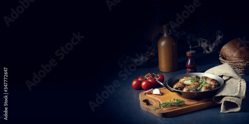 Homemade white sausage fried with onion and herbs