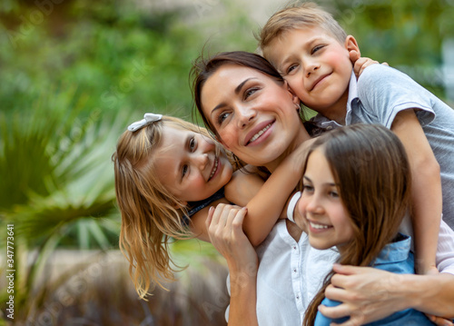 Happy mother with her kids