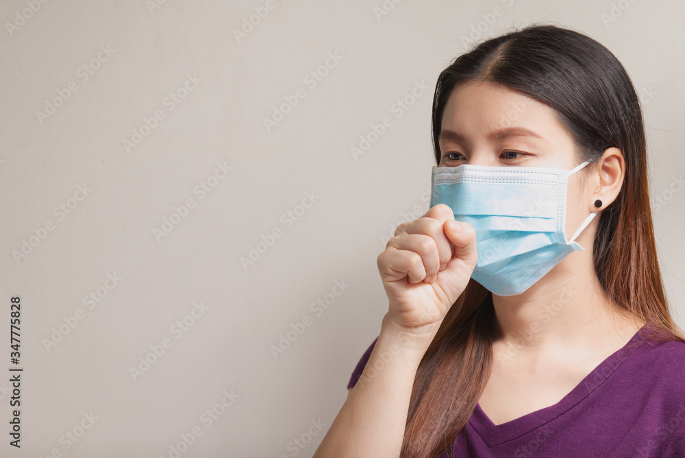 Young female put mask, with cough and sore throat on white background