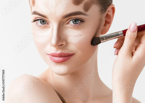 Make up woman face brush lines beauty model face cosmetic skin tone portrait