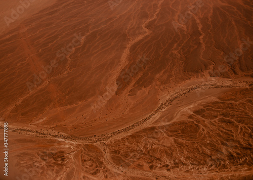 Photo of desert from the plane. View from above.  Situational plan with alien landscape.