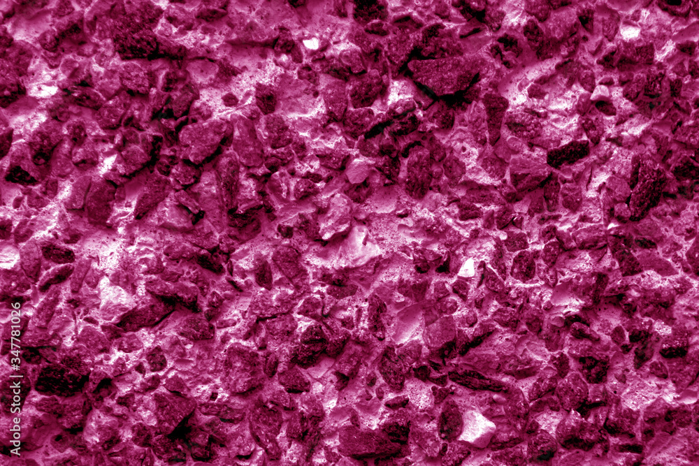 Old stone surface in pink tone. Old stone surface in pink tone.