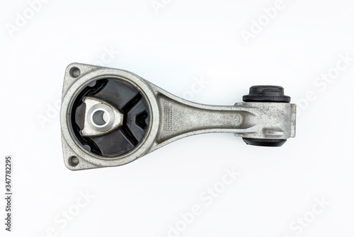 An engine mount, in the shape of an arm, used to stabilize the diesel power unit, isolated on a white background with a clipping path, view from above.