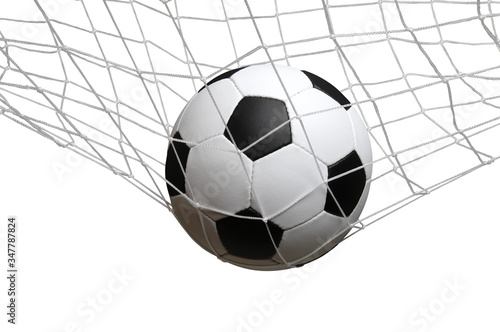 soccer ball in the net on a white