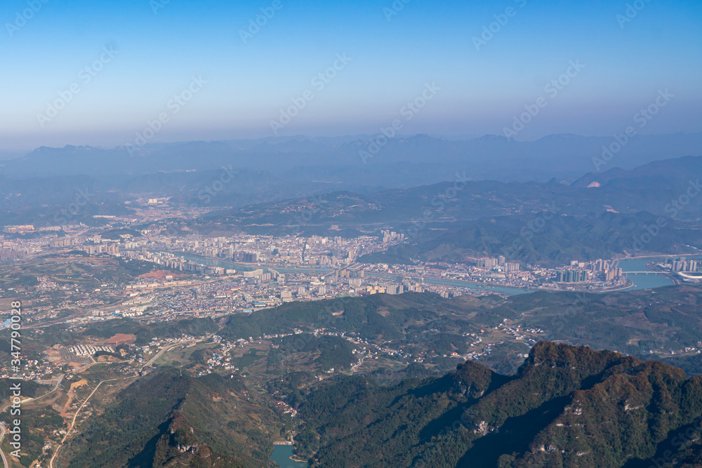 Aerial view of mountain and city in Hunan province, China 