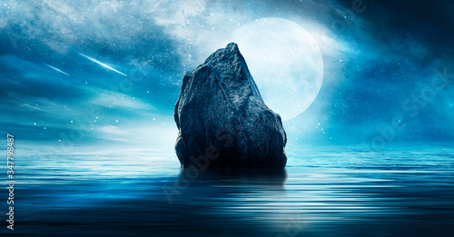 Night futuristic landscape. Reflection of the moon on sea water. Large stones, rocks on the shore, shells. Blue abstraction. Rays of meteorites, neon blue light. Night landscape, island.