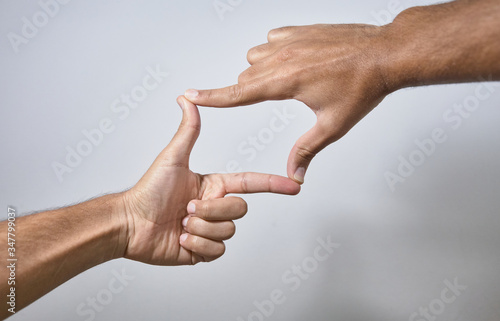 hands making square on white background © sacho