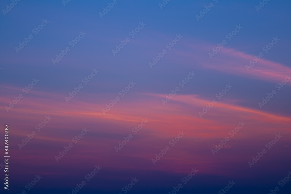 sunset, gradient texture of the sky from dark blue to orange.