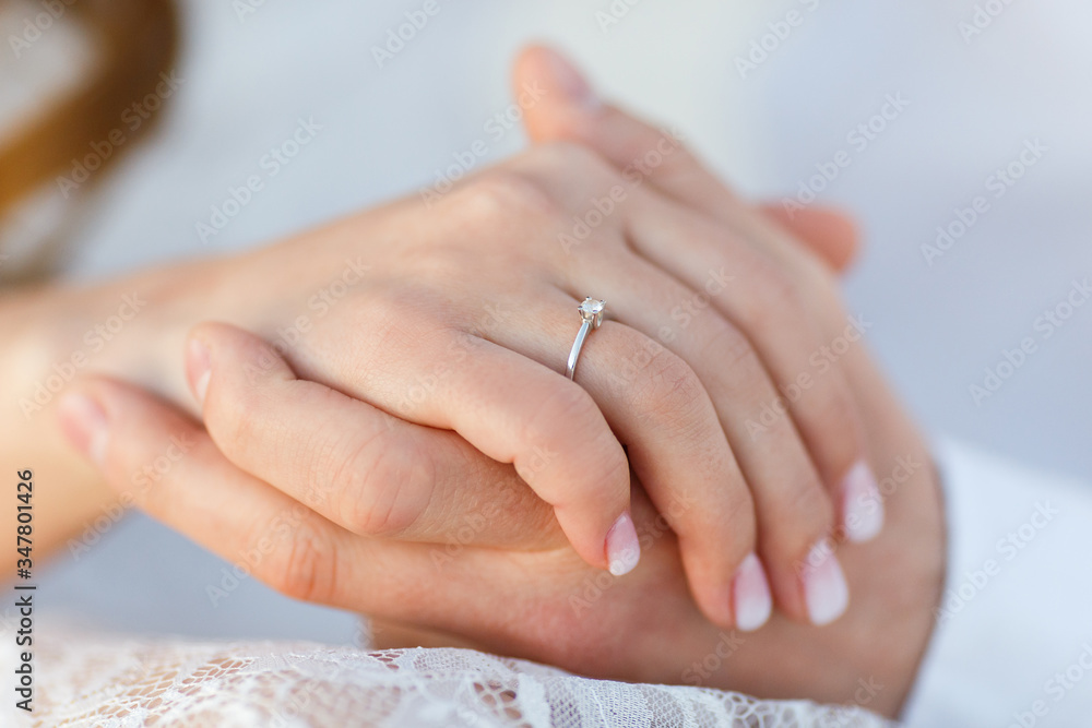 the girls hand holds the beloveds hand the girls hand holds the beloveds hand