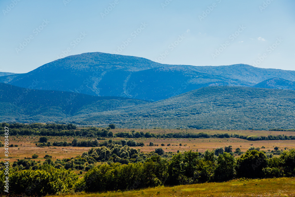mountain landscape of mountains with forest and blue sky mountain landscape of mountains with forest and blue sky