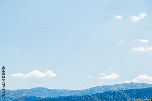 mountain landscape of mountains with forest and blue sky