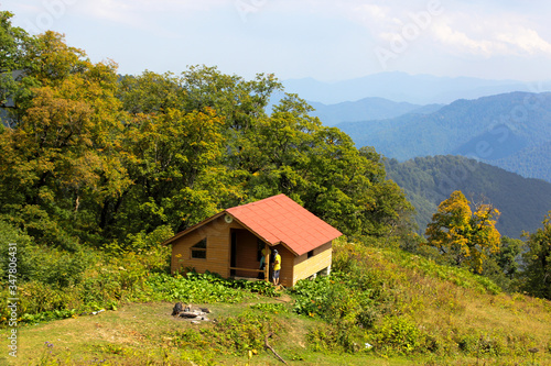 hut in mountain wild