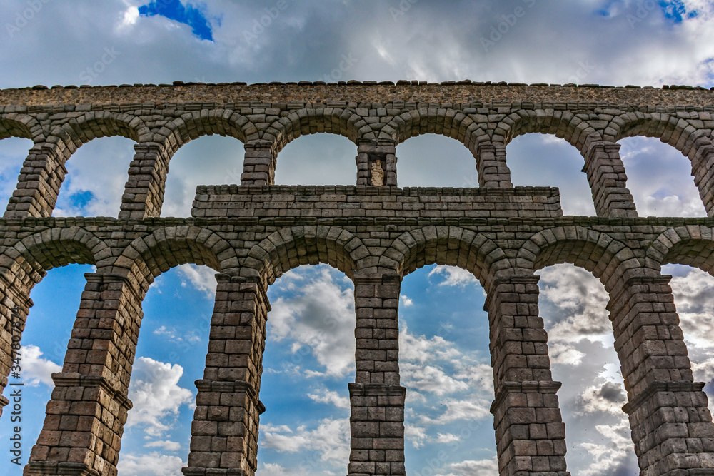 The famous Roman aqueduct of Segovia in Spain. Heritage of humanity by unesco. The famous Roman aqueduct of Segovia in Spain. Heritage of humanity by unesco.