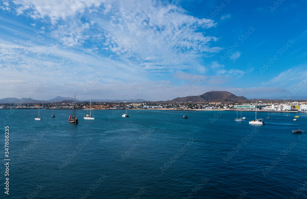 CORRALEJO FUERTEVENTURA SPAIN - OCTOBER 2019: Port with white boats in Corralejo.