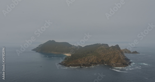 view to island san martino in province pontevedra foggy day
