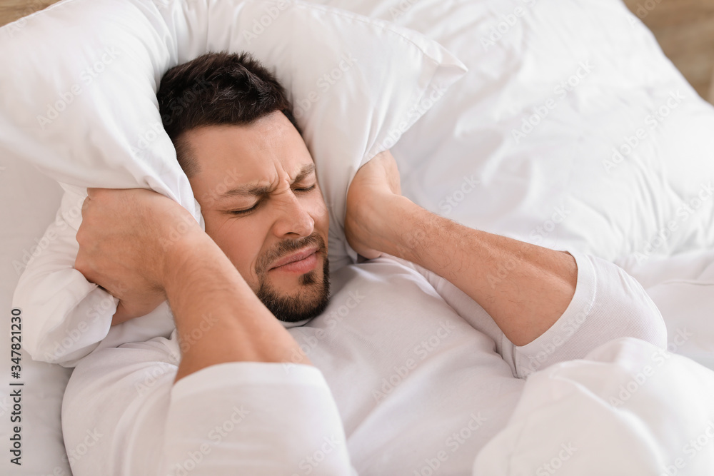 Man cannot sleep because of rowdy neighbours Man cannot sleep because of rowdy neighbours