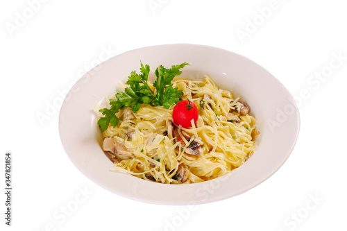 Spaghetti with cheese and shrimp and cream sauce. White background Italian food