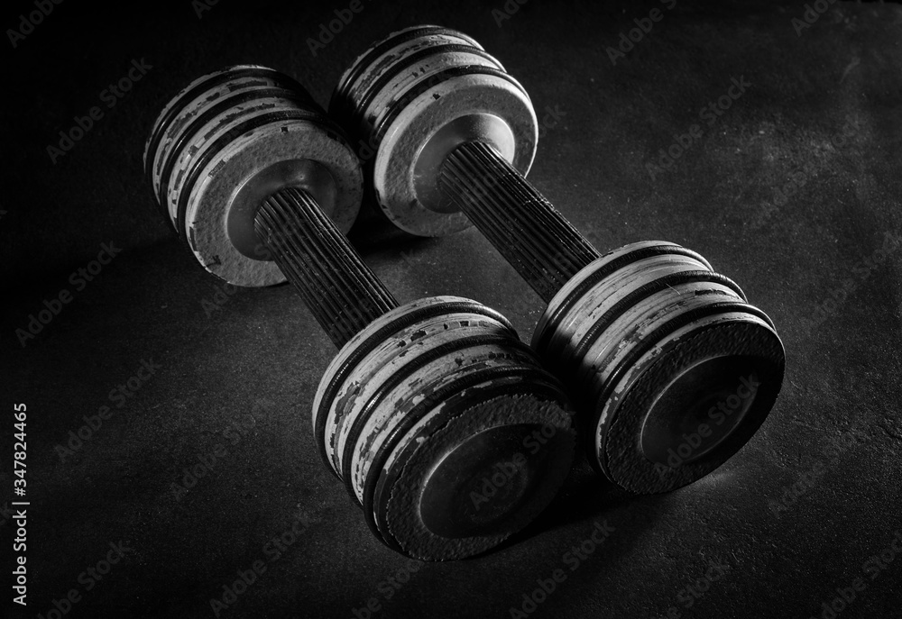 Naklejka premium Fitness Sport Background eith black dumbbells