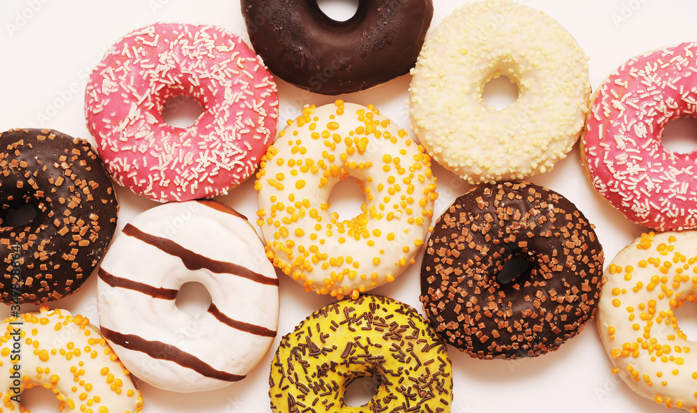 Delicious donuts on white color background. Delicious donuts on white color background.