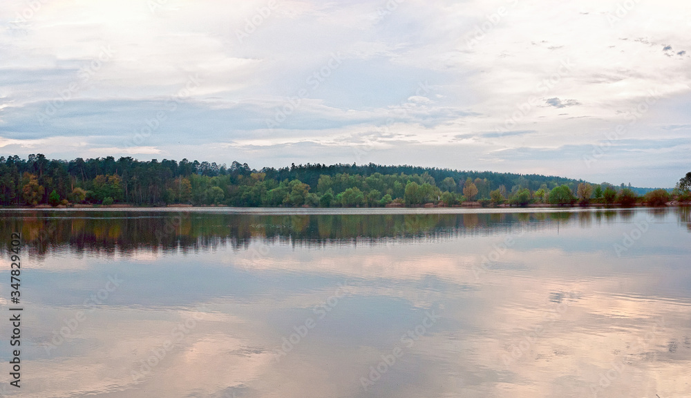 panorama landscape of green forest on the shore of a large lake. Pond 15, known as the 5 glade. Kyiv, Ukraine panorama landscape of green forest on the shore of a large lake. Pond 15, known as the 5 glade. Kyiv, Ukraine