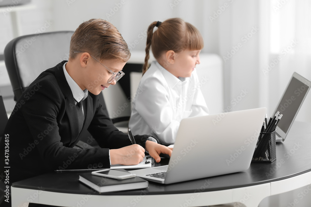 Little secretaries working in office Little secretaries working in office