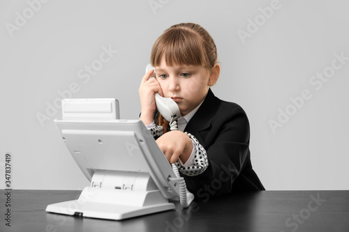 Little secretary working ag...