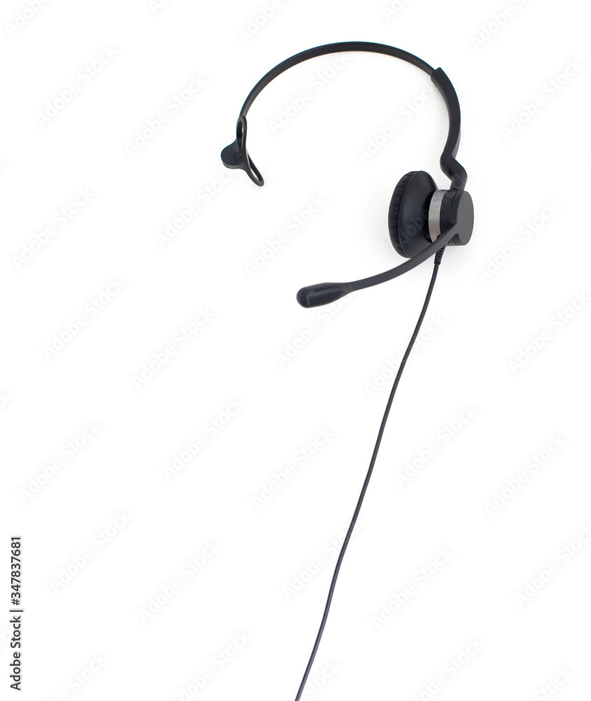 VOIP headset, pen and notebook on laptop computer keyboard. Communication support for callcenter and customer service Helpdesk. VOIP headset, pen and notebook on laptop computer keyboard. Communication support for callcenter and customer service Helpdesk.