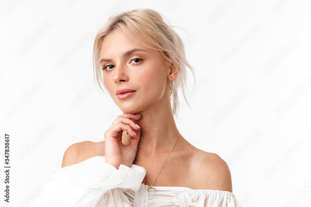 Image of beautiful blonde woman posing and looking at camera Image of beautiful blonde woman posing and looking at camera