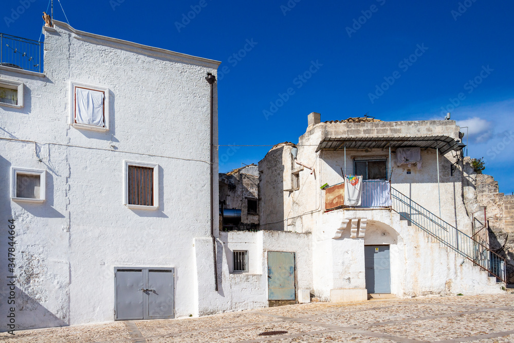 Old whitewashed buildings in Via Chiesa, Chiesa Street or Church Street in Laterza, Apulia Region, Province of Taranto, Italy Old whitewashed buildings in Via Chiesa, Chiesa Street or Church Street in Laterza, Apulia Region, Province of Taranto, Italy