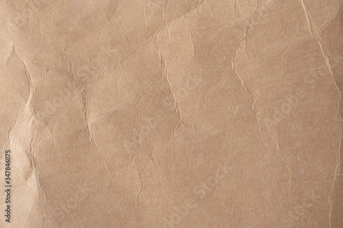 Brown crumpled paper texture background.