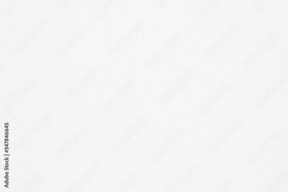 White canvas texture background. Close-up. White canvas texture background. Close-up.
