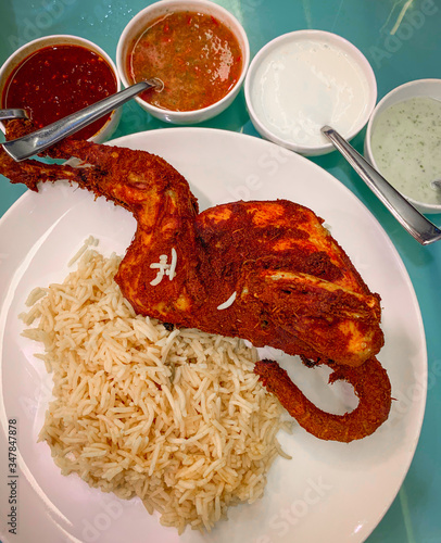 Rice with full chicken 