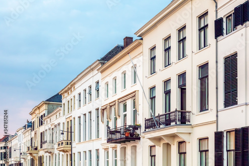 Row of ancient white houses in the Dutch city center of Zutphen