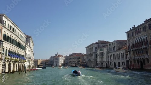 Venice, Italy - 07 11 2016: View of the Canal Grande in venice while traveling on the public transportation ferry. It is possible to see all the boat traffic of the canal