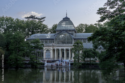 blue hour photography cristal palace in biggest park of madrid capital city