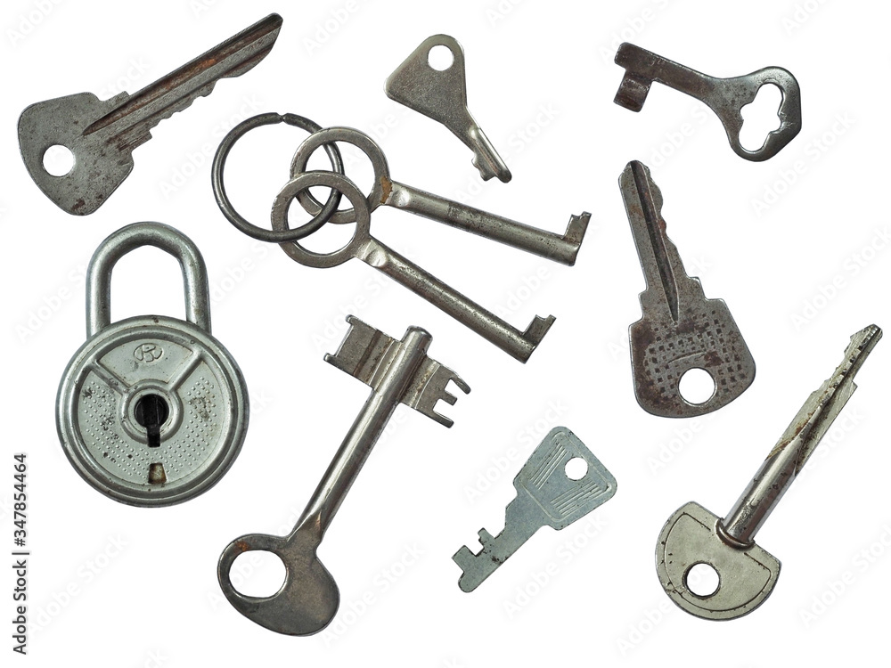 lock and many keys of different shapes isolated on a white background lock and many keys of different shapes isolated on a white background