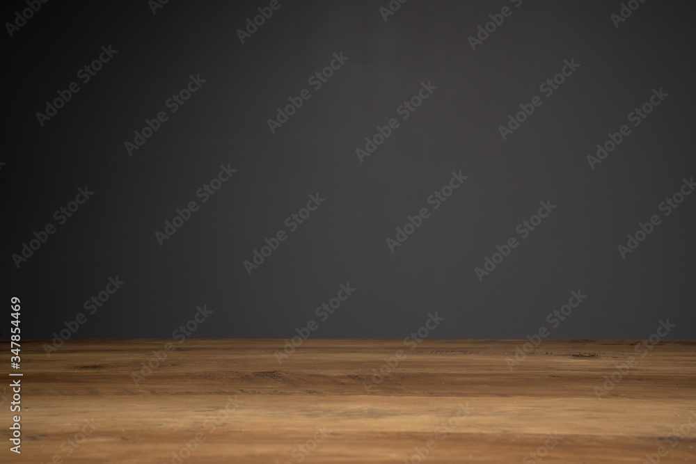 top of wooden table and dark background with copy space. top of wooden table and dark background with copy space.