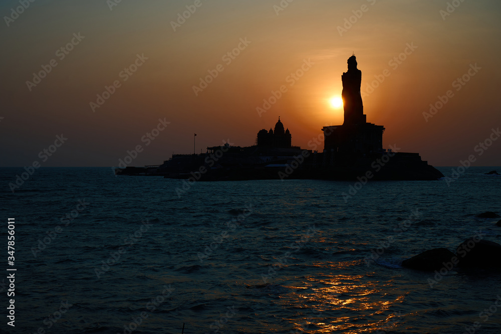 Sunrise at Kanyakumari. One of the most awaiting scene with a nice reflection on the sea. Sunrise behind the statue of Thiruvalluvar(133 feet on offshore). Who is a great poet. 
