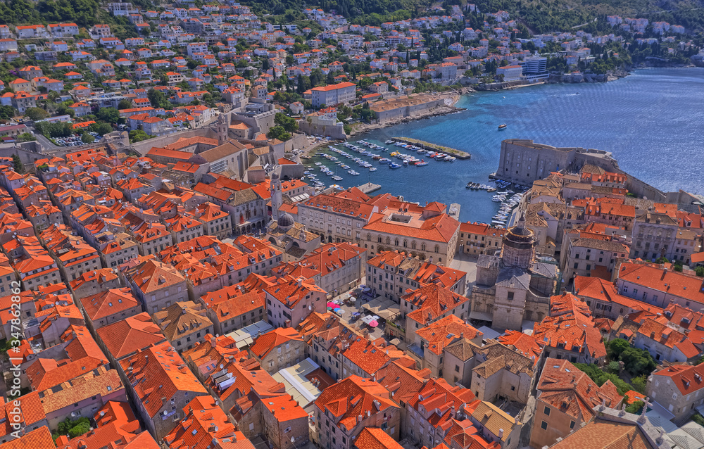 Aerial drone panorama of the Dubrovnik old town port with all the famous sights around it.