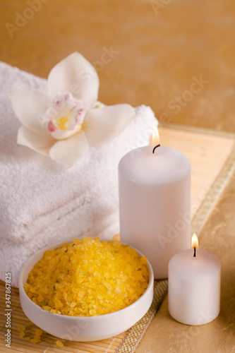 Yellow sea salt and candles