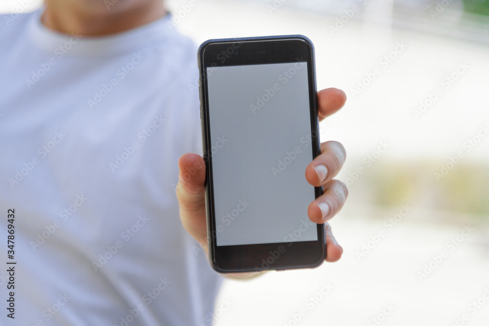 Man showing a mobile