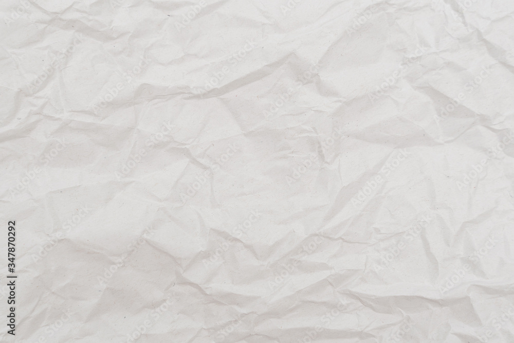 White crumpled paper texture. Abstract paper pattern for background. Close-up. White crumpled paper texture. Abstract paper pattern for background. Close-up.