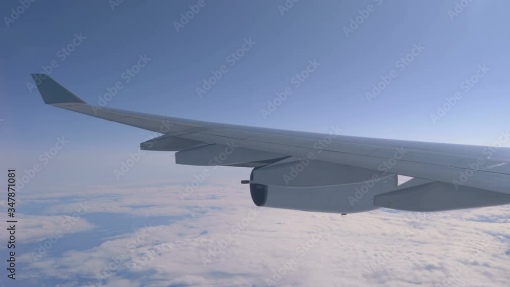 Airplane flight above clouds in 4K Slow motion 60fps Airplane flight above clouds in 4K Slow motion 60fps