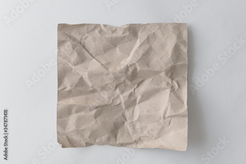 Brown wrinkle recycle paper background. Crumpled brown paper on white background, can use text banners products.