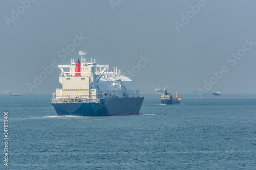 LNG tanker is passing by Singapore Strait.